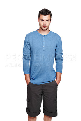 Buy stock photo Man, studio portrait and casual fashion with serious face, style and focus by white background. Young isolated model, shorts and clothes with calm, relax or handsome with cool confidence in lifestyle