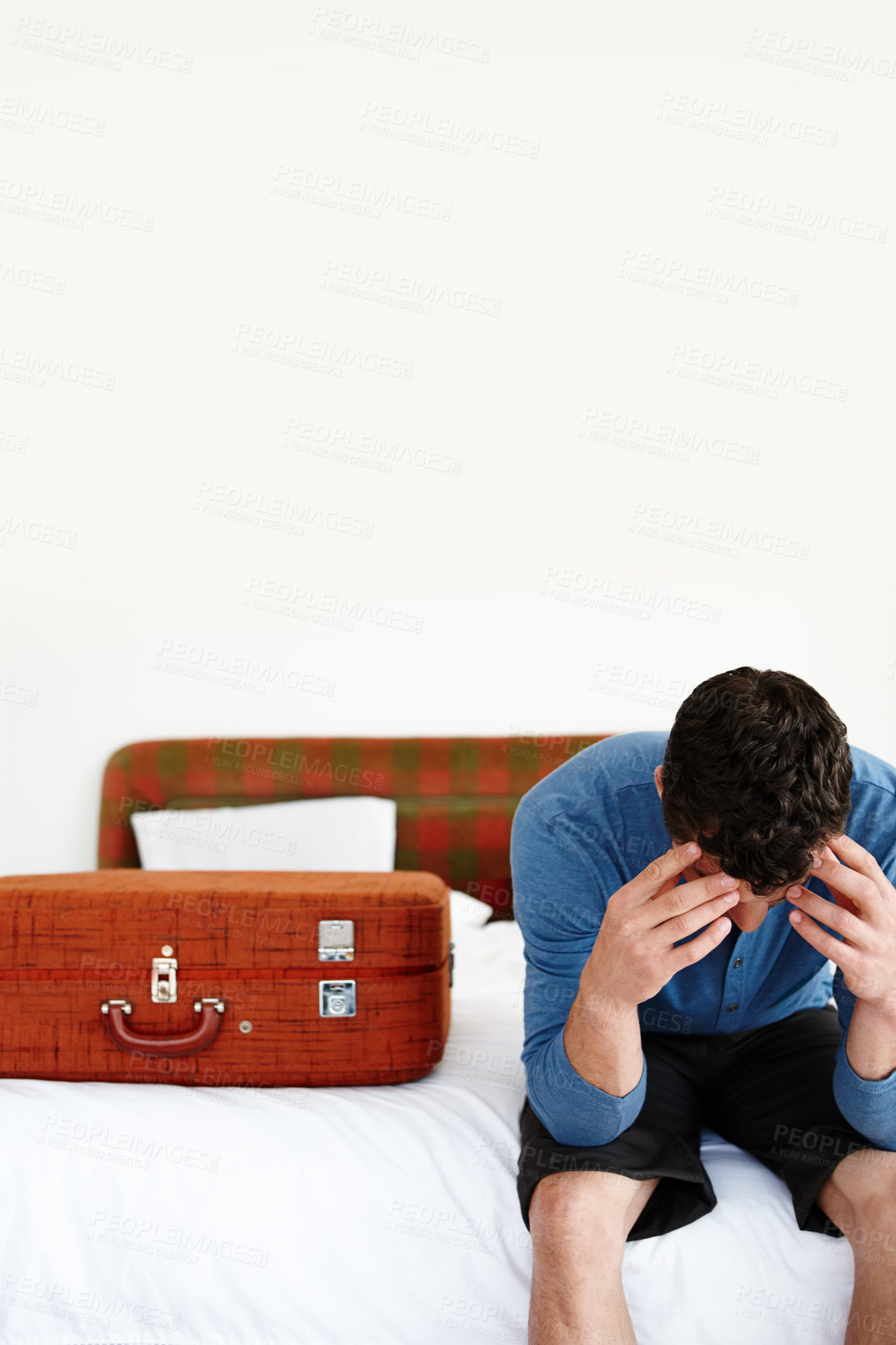 Buy stock photo Man, thinking and suitcase on bed in hotel for travel, vacation and summer with anxiety in Spain. Tourist, stress and planning with luggage in bedroom for journey, holiday and weekend with fear