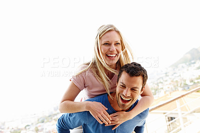Buy stock photo A playful young couple having fun together