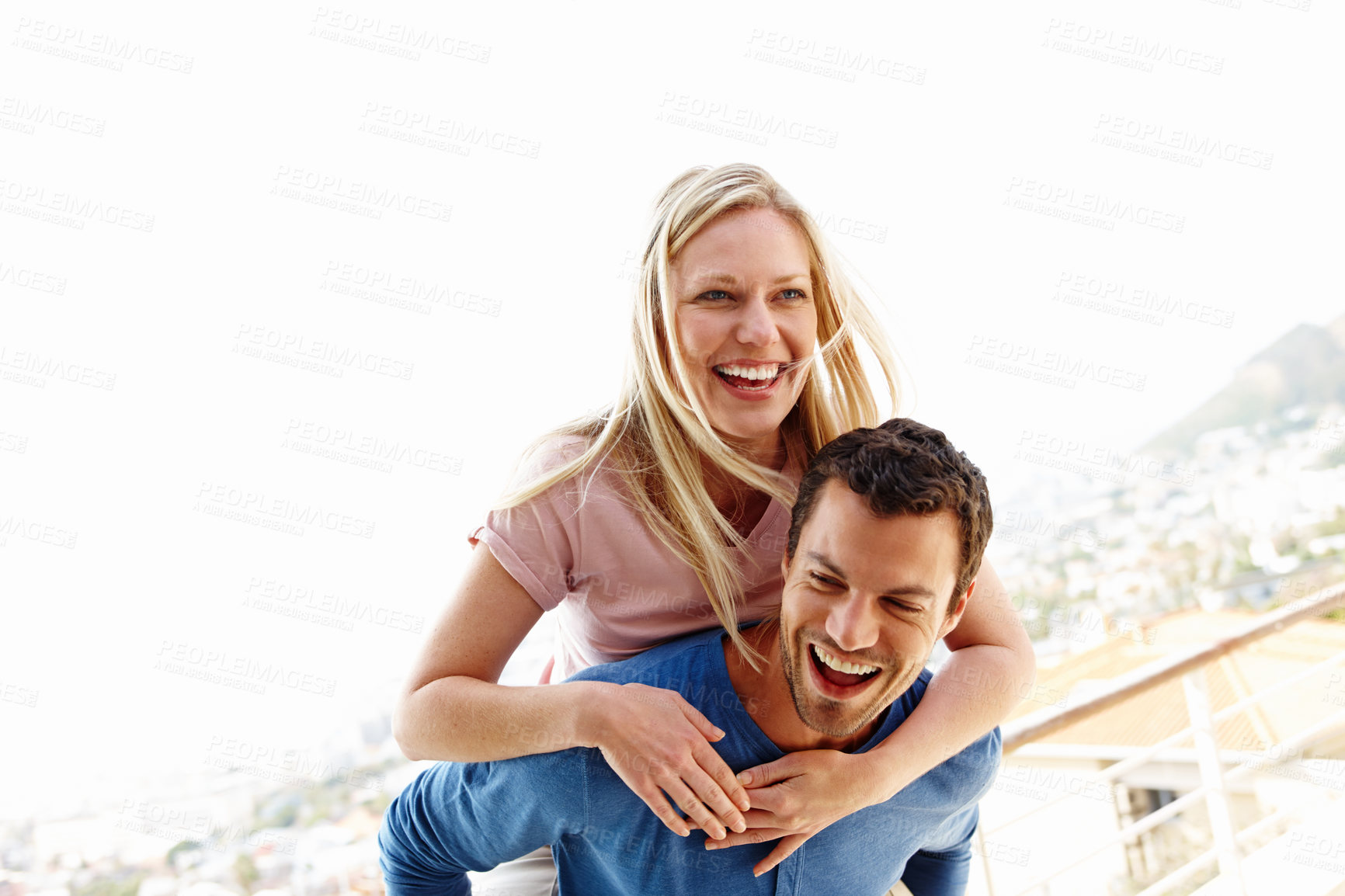 Buy stock photo A playful young couple having fun together