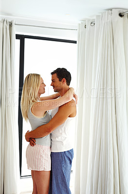 Buy stock photo Couple, hug and peace in home for love in relationship, romance and weekend for speaking. People, embrace and together for affection in marriage, bonding and support in conversation for apartment