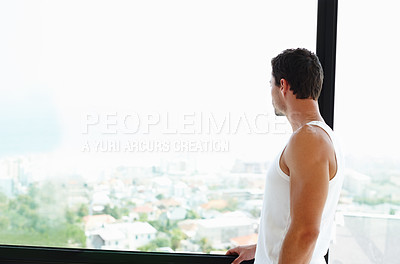 Buy stock photo Man, window and thinking or morning in home, remember and hospitality accommodation with city view. Memory, mock up and relax on weekend break or holiday, wellness and thoughtful reflection