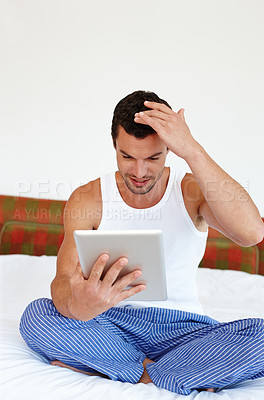 Buy stock photo Happy, tablet and man on bed in home for social media, online streaming and internet in bedroom. House, morning and person on digital tech for reading website, news and communication on weekend