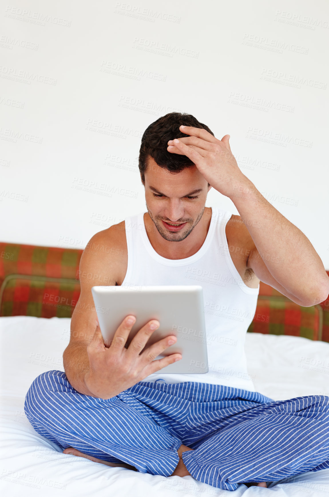 Buy stock photo Happy, tablet and man on bed in home for social media, online streaming and internet in bedroom. House, morning and person on digital tech for reading website, news and communication on weekend