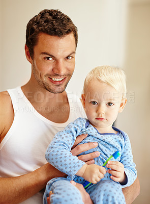 Buy stock photo Portrait, father and boy child with toothbrush for oral hygiene, learn or morning routine in bathroom. Family, care and young kid with man for teeth cleaning, development or dental wellness at home