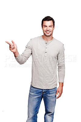 Buy stock photo Man, studio and portrait while pointing finger at space for advertising isolated on a white background. Happy male model from France with hand sign for promotion, announcement and brand product