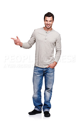 Buy stock photo Portrait, pointing and mockup with a man model in studio isolated on a white background for branding. Point, marketing and advertising with a handsome male standing on blank porduct placement space