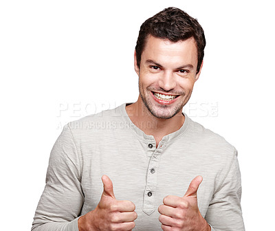 Buy stock photo Portrait, hands and thumbs up with a man in studio isolated on a white background as a winner or for motivation. Thank you, goal and target with an excited man showing a positive hand sign or emoji