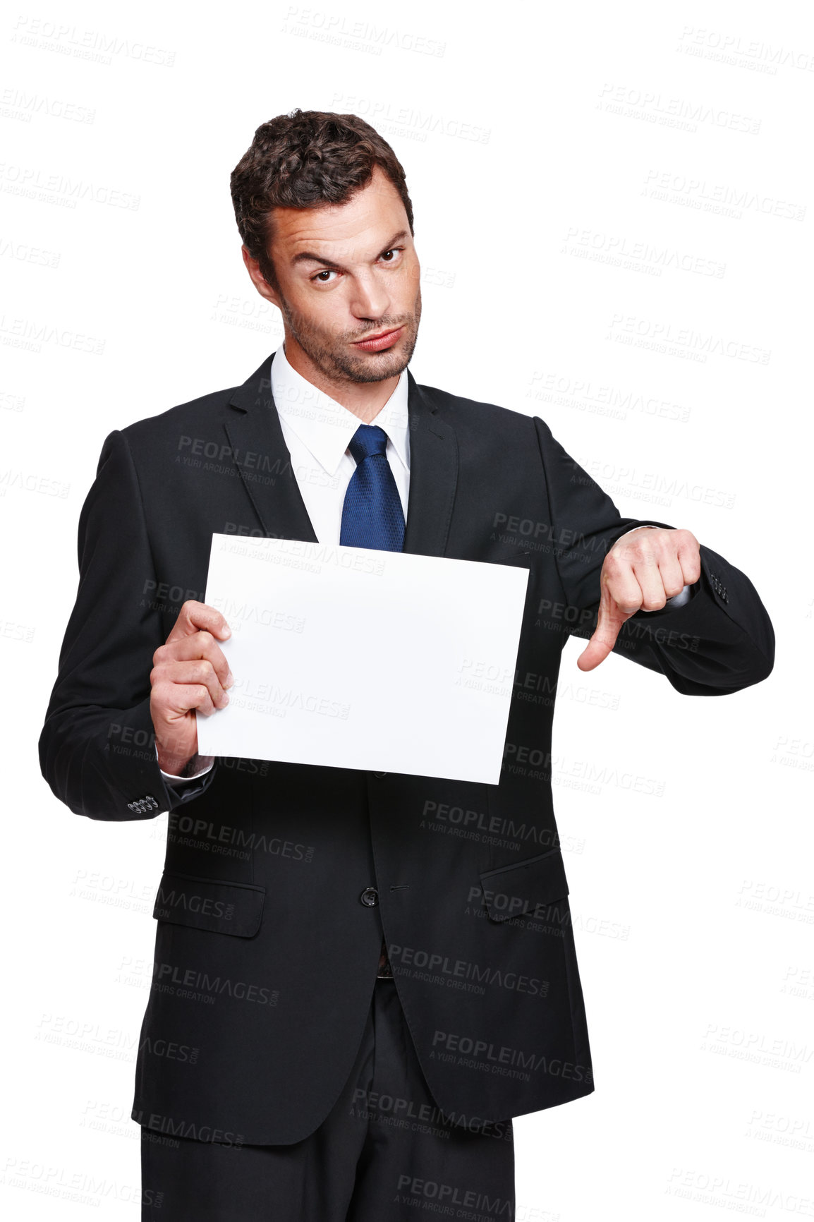 Buy stock photo A handsome young businessman holding a placard and giving you a thumbs down