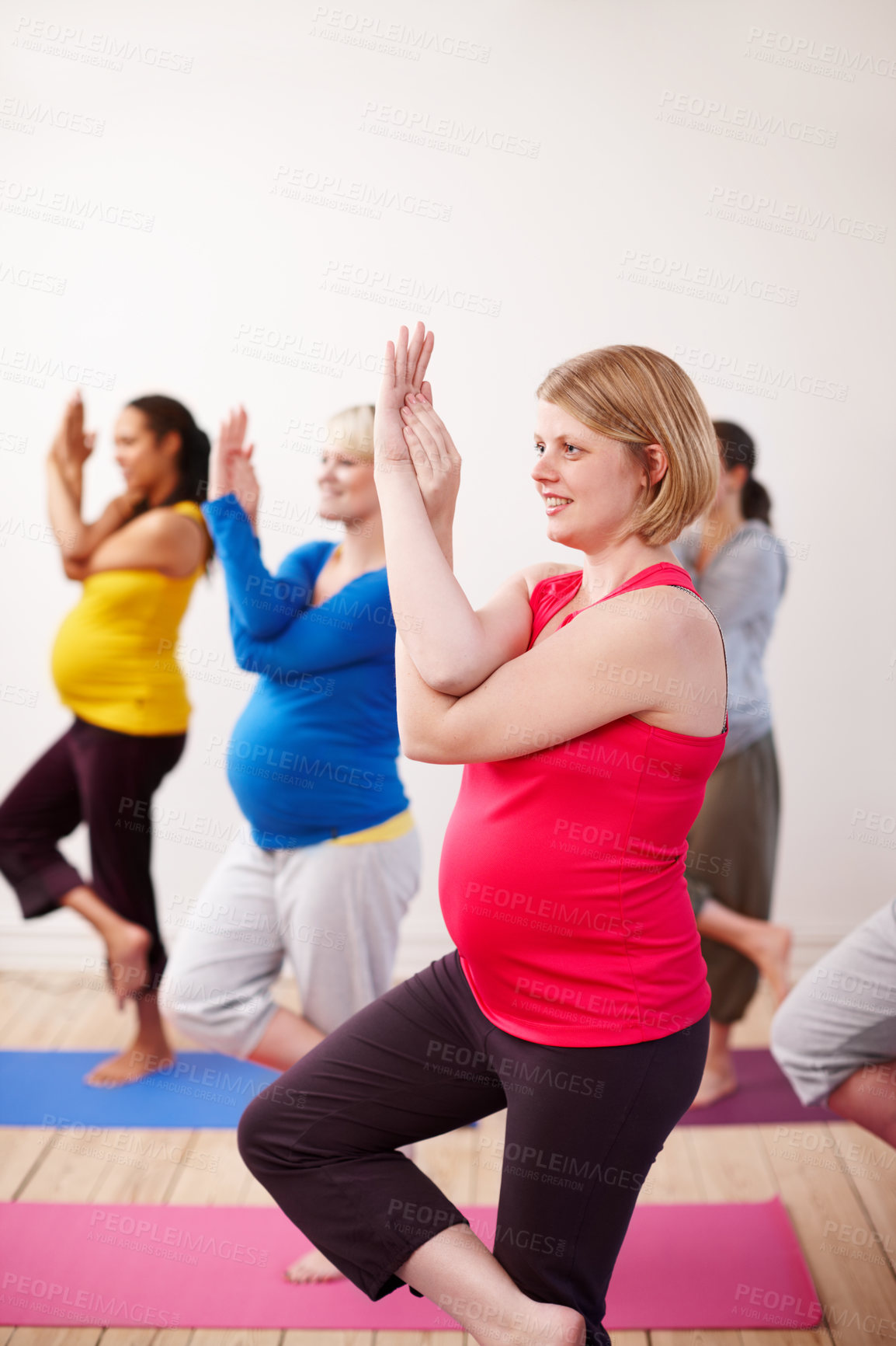 Buy stock photo Pregnant, woman and yoga class with friends, balance and  pregnancy pilates. Exercise, fitness and group for eagle pose and happy people, mother or maternity workout for health or support together