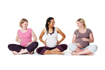 Buy stock photo Women, group and pregnant on floor for yoga, smile and conversation in studio by white background. People, mother and wellness club for pregnancy with chat, happy and care with connection for support