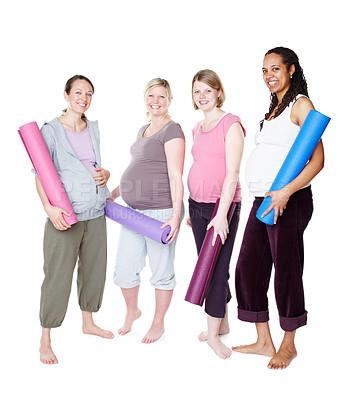 Buy stock photo Pregnant friends standing together and holding their yoga mats while isolated on white