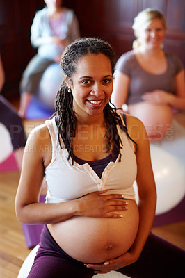 Buy stock photo Woman, portrait and prenatal yoga for pregnant, health and wellness with class, happiness and smile. Mother, stomach and face in studio for fitness, back pain and body awareness with group of people