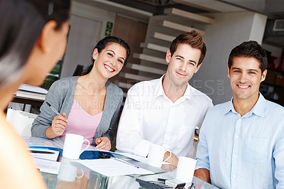 Buy stock photo Portrait of a creative team of businesspeople sitting around the boardroom table