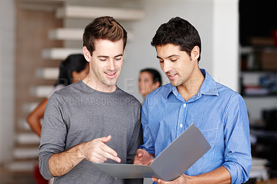 Buy stock photo Discussion, portfolio and team in office for collaboration, project or agenda for development. Trader, partners and folder in workplace for feedback, budget and business with paperwork for investment