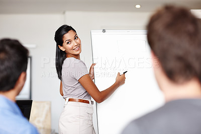 Buy stock photo Business woman, speaker and meeting at board for budget management and financial training. Workshop, seminar and conversation with mentor, planning and accounting for audit advice in office with team