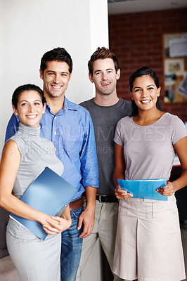 Buy stock photo Portrait of a successful design team smiling confidently