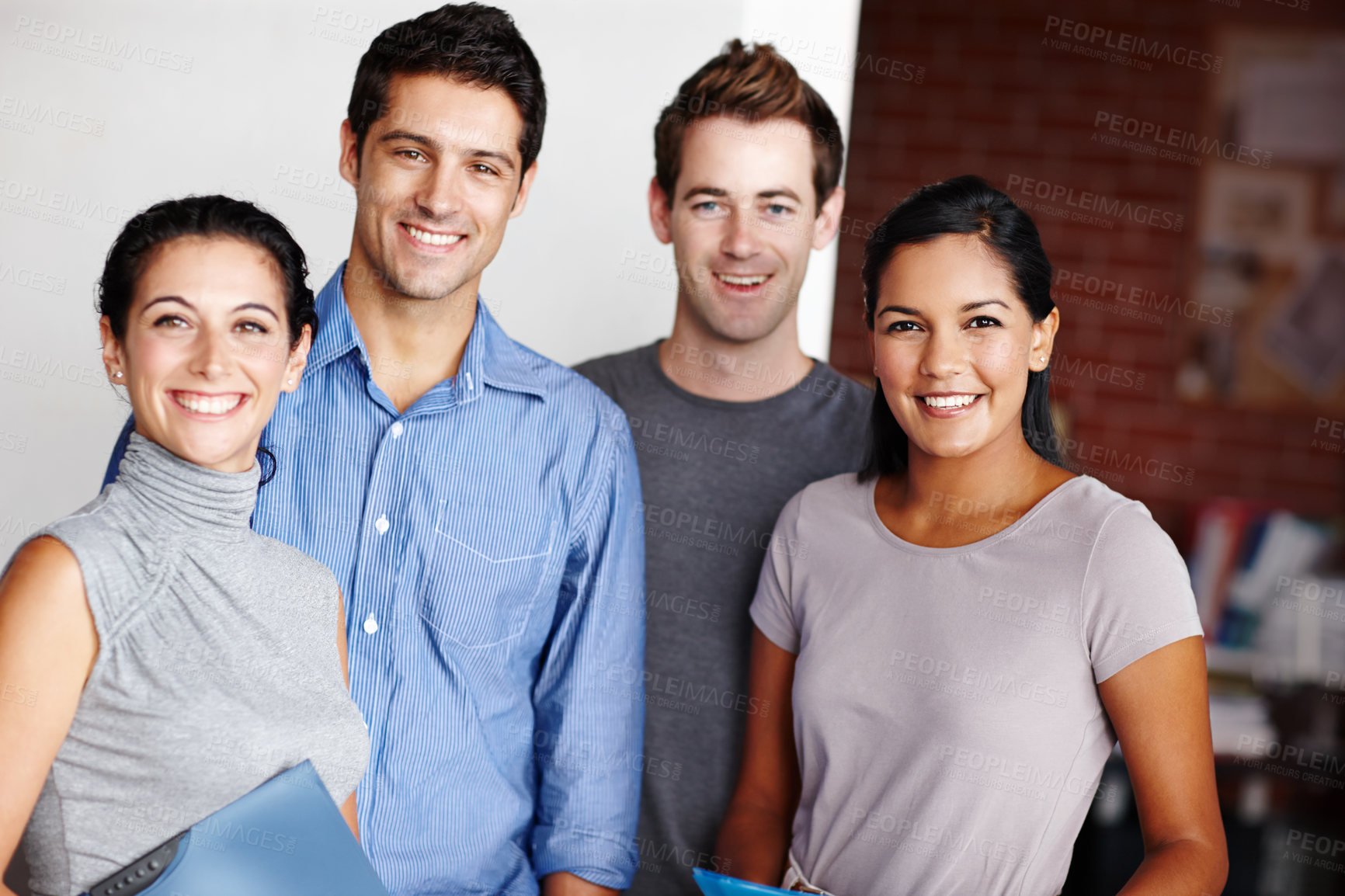 Buy stock photo Portrait of a successful design team smiling confidently