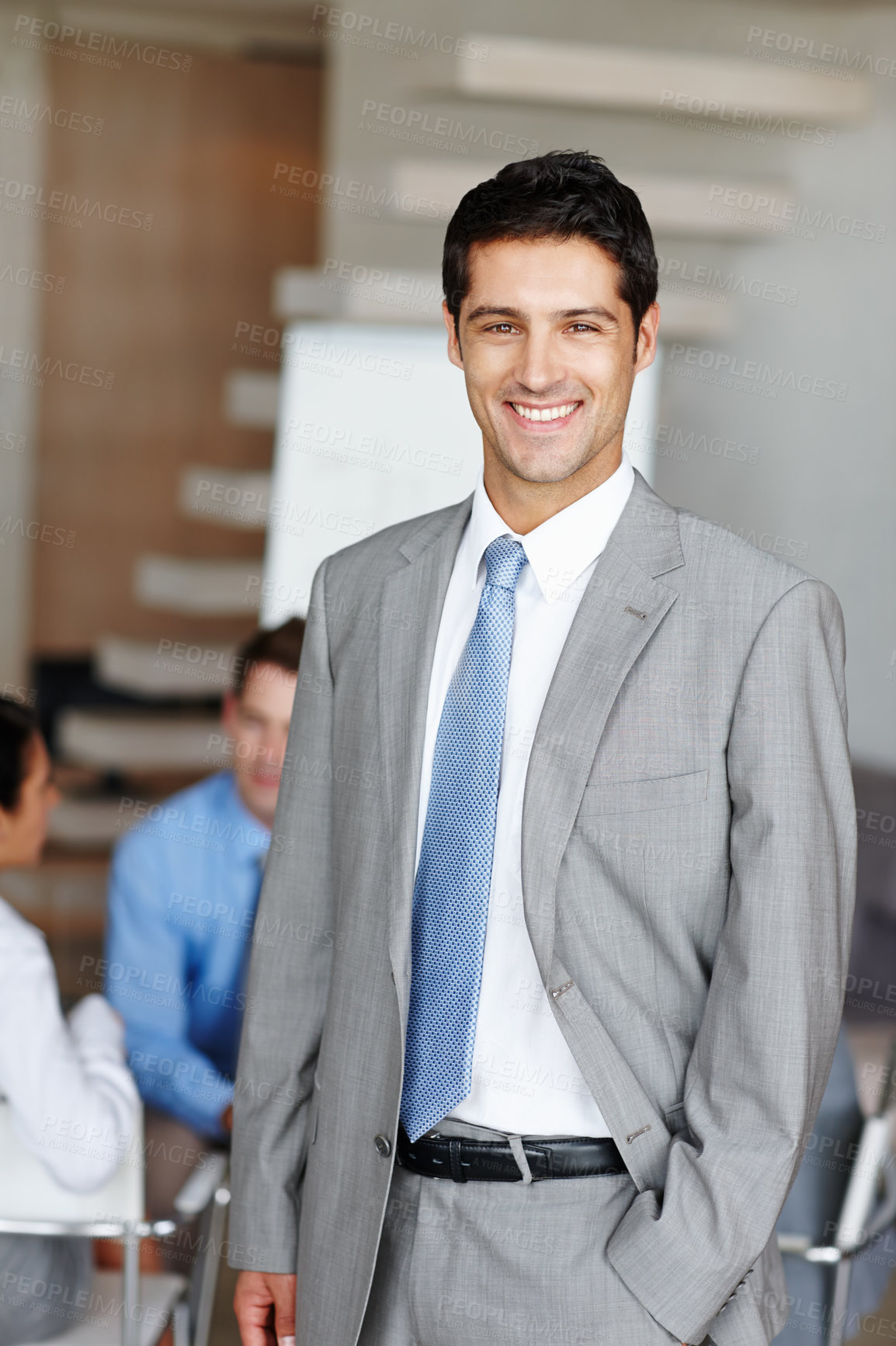 Buy stock photo A young executive smiling at you confidently