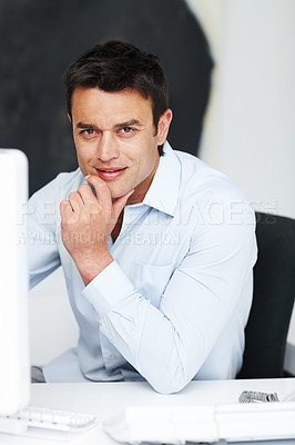 Buy stock photo A young businessman working in the office