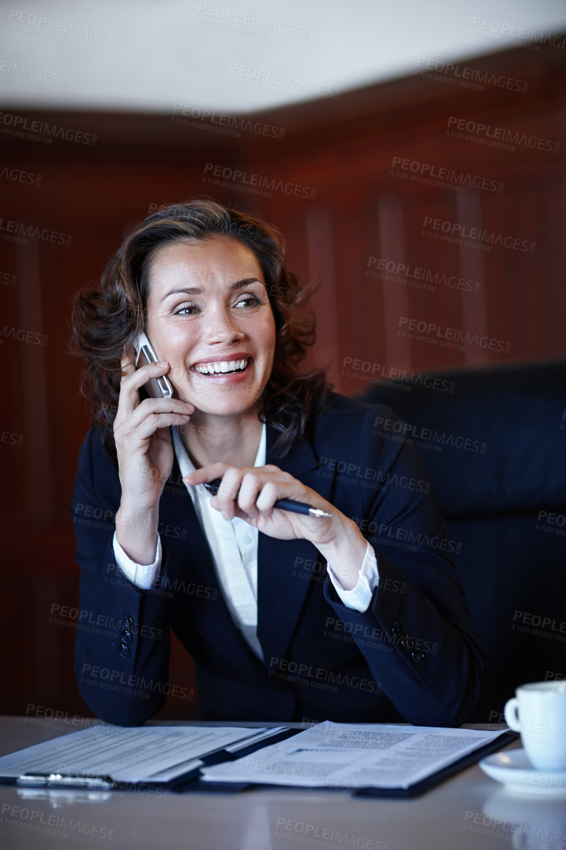 Buy stock photo Listening, lawyer or businesswoman in office for phone call, legal advice and immigration case with client. Smile, female advocate or mobile for discussion, legislation or prepare contact for justice