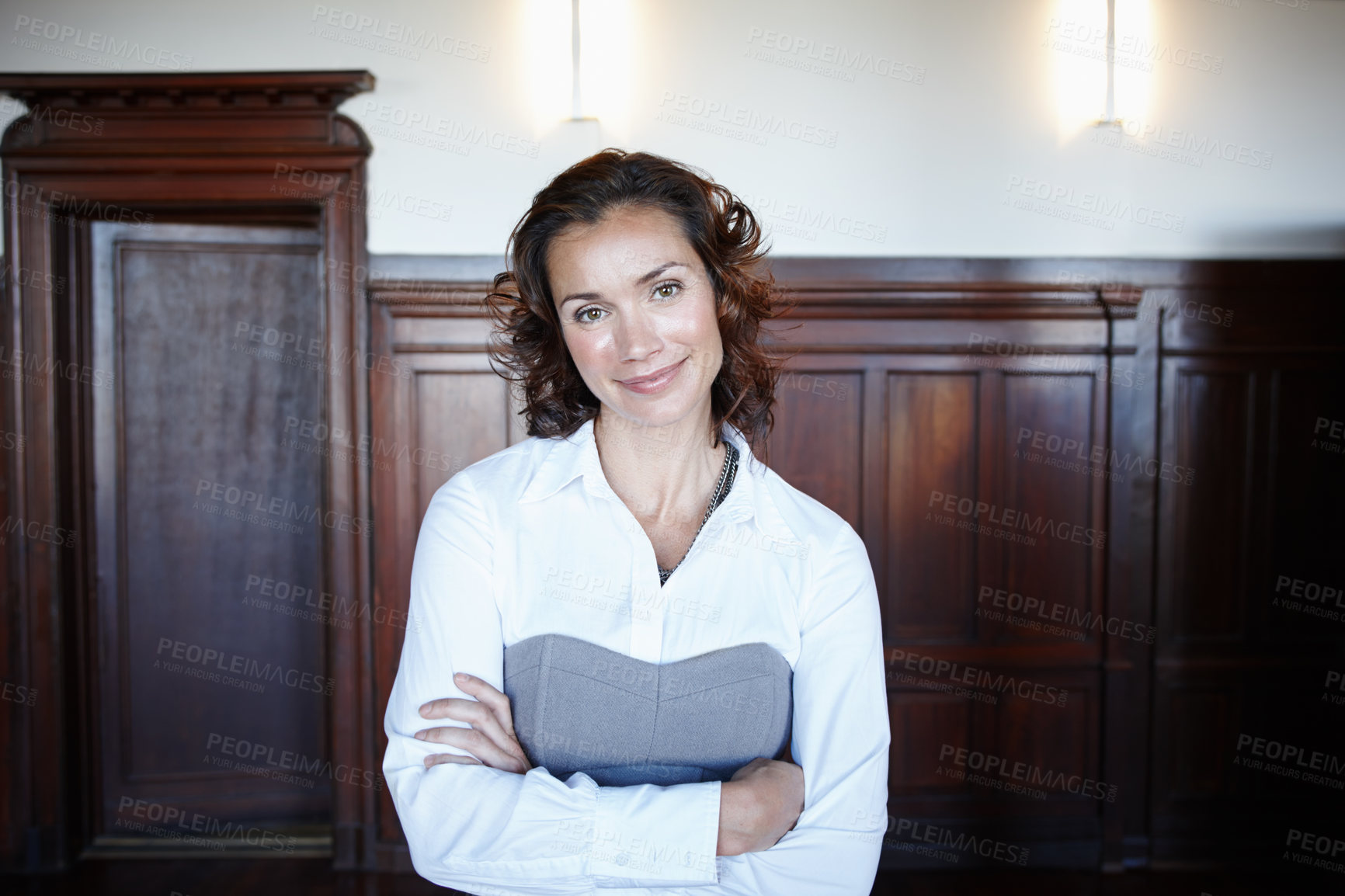 Buy stock photo Portrait, lawyer and happy woman with confidence in courtroom for business pride, career or job. Face, attorney and professional in office with arms crossed for legal system, justice and experience