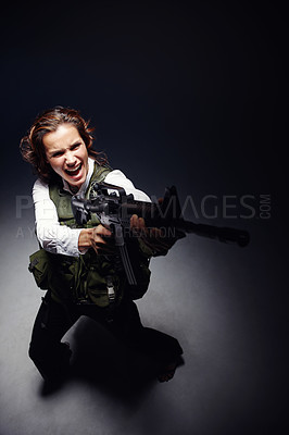 Buy stock photo Woman, rifle and tough soldier in studio, angry detective killer and military on black background. Female person, agent training and gun for guard equipment, criminal weapon and danger to security