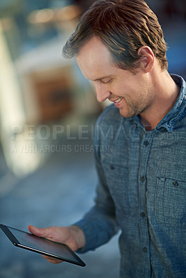 Buy stock photo Man, tablet and worker at office for agency with ux project, digital communication and web design. Technology, startup employee and smile in modern workplace for creative company, internet and online