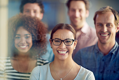 Buy stock photo Portrait of a group of colleagues standing together
