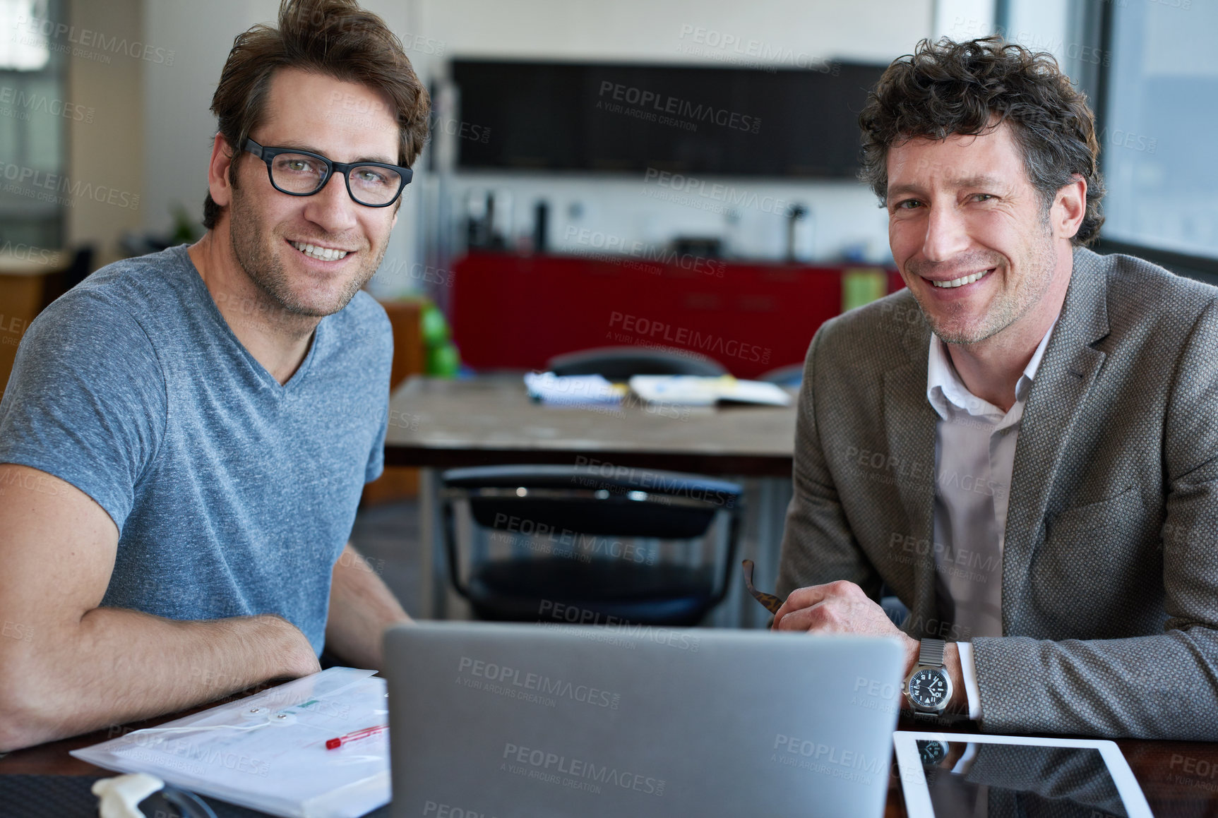 Buy stock photo Colleague, laptop and portrait in office with tablet for company career and online planning for web with document for research. Employee or analyst with digital device and paperwork for email project