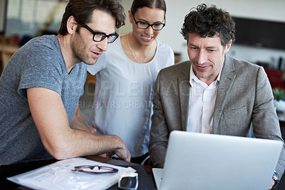 Buy stock photo Serious, business people and meeting with laptop, documents and paperwork for collaboration on proposal. Teamwork, ceo and employee with feedback, planning and communication together in office
