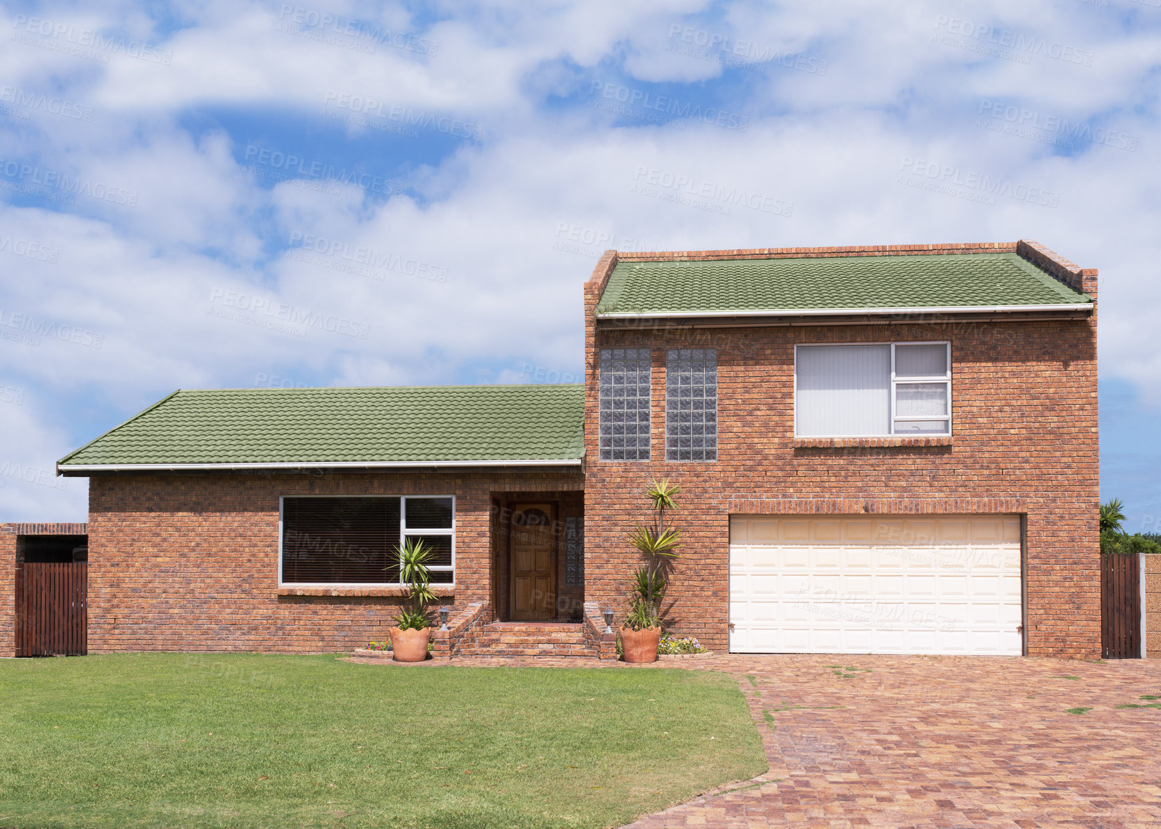 Buy stock photo Modern, house and real estate with front exterior for garage of architecture with building project growth. Property, luxury and homes with lawn outdoors for development of structure in suburb
