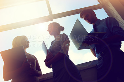 Buy stock photo Sunshine, collaboration and silhouette of professional people teamwork on project discussion, planning or group meeting. Communication, lens flare and workforce conversation on corporate plan 