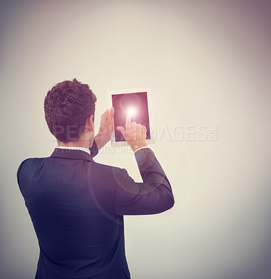 Buy stock photo Businessman, tablet and touch with mockup space for interaction, UI or UX on a studio background. Rear view of man or employee on technology for digital innovation, connectivity or communication