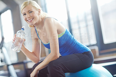 Buy stock photo Smile, portrait or woman on ball drinking water on break in exercise, gym workout or fitness training. Tired, happy girl or thirsty sports athlete with bottle to relax for wellness, rest or hydration