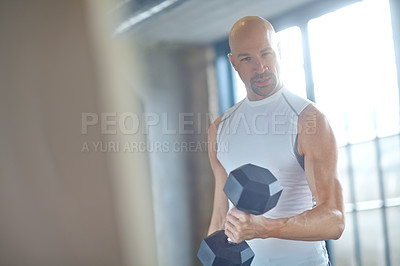 Buy stock photo Man, bodybuilder and weight lifting portrait in gym for fitness with dumbbell, workout challenge and strong muscle. Athlete, strength training or bodybuilding exercise for power competition on mockup