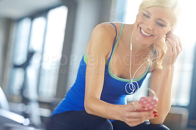 Buy stock photo Exercise, music and water for break with woman in gym, thinking about health, wellness or workout. Fitness, hydration and smile with happy young person at training center for physical improvement