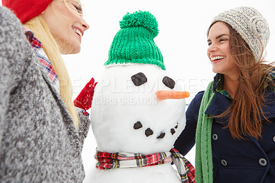 Buy stock photo Women, snow and snowman with Christmas selfie and holiday, winter break in Canada with festive spirit and tradition with friends outdoor. Nature, smile in picture and happy with Xmas and celebration.