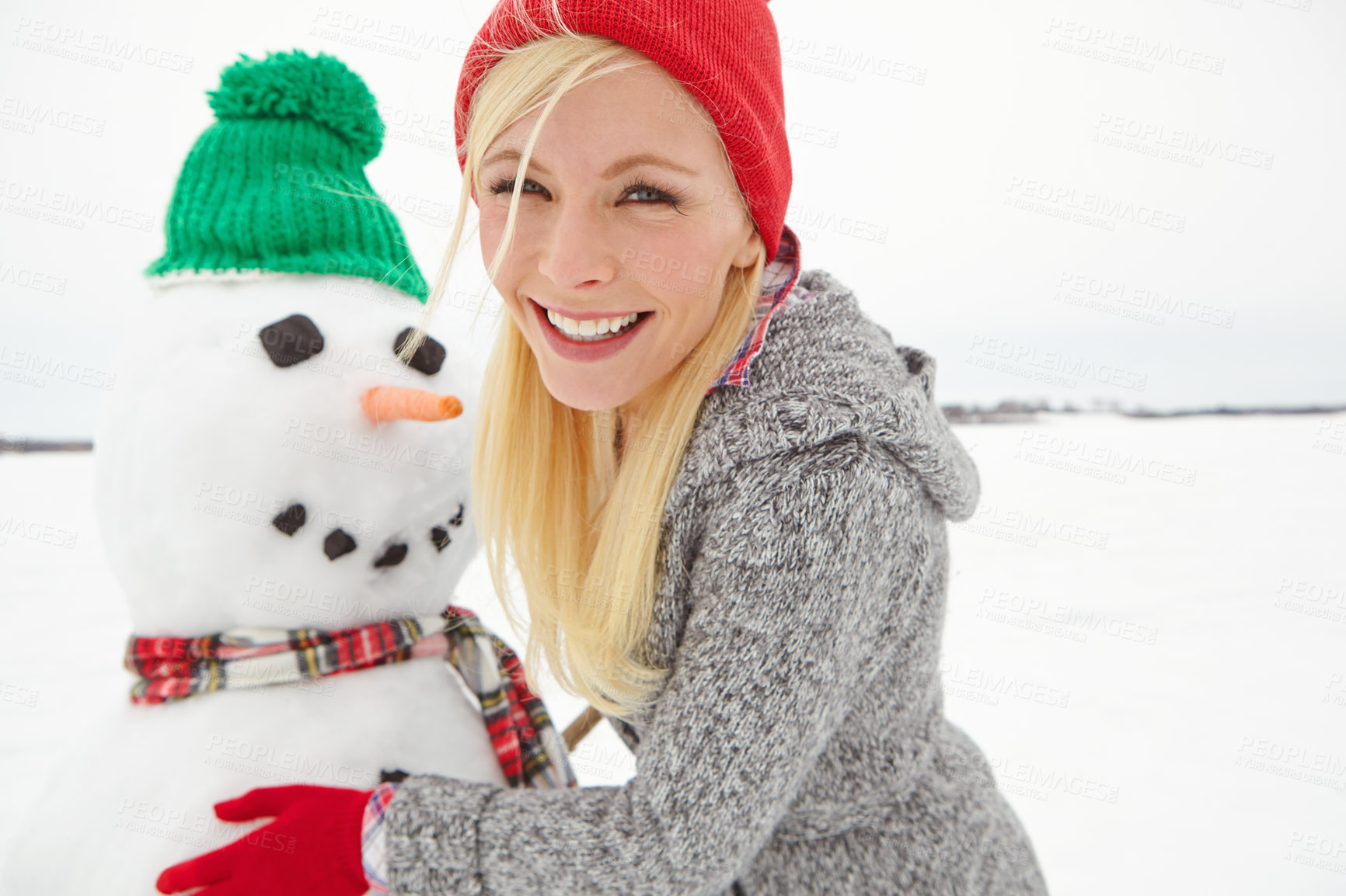 Buy stock photo Christmas, holiday and woman with snowman in winter vacation portrait, happy building with snow and celebration. Festive spirit with Xmas tradition outdoor, happiness and celebrate with nature.