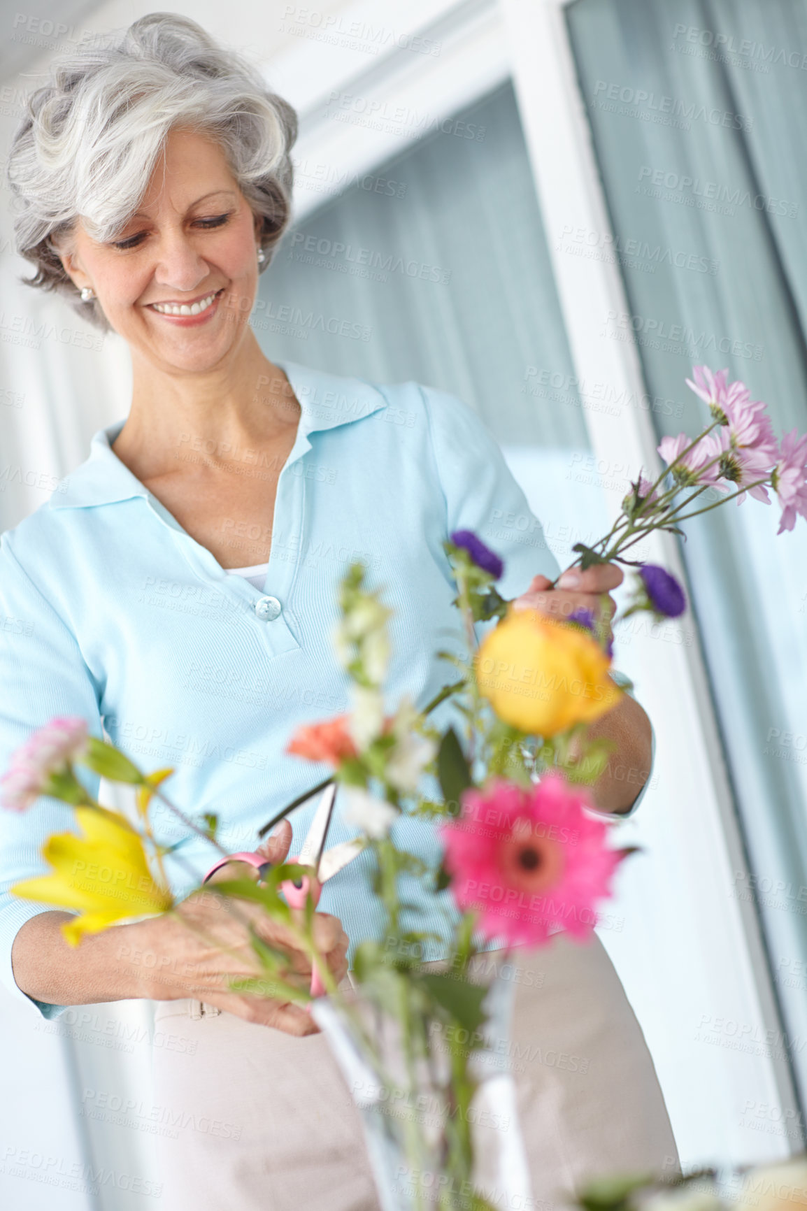 Buy stock photo Happy, senior woman and flowers on patio for decoration, natural or creative at house. Retired female person, bouquet and plants with scissors for gardening, ornament or color in retirement home