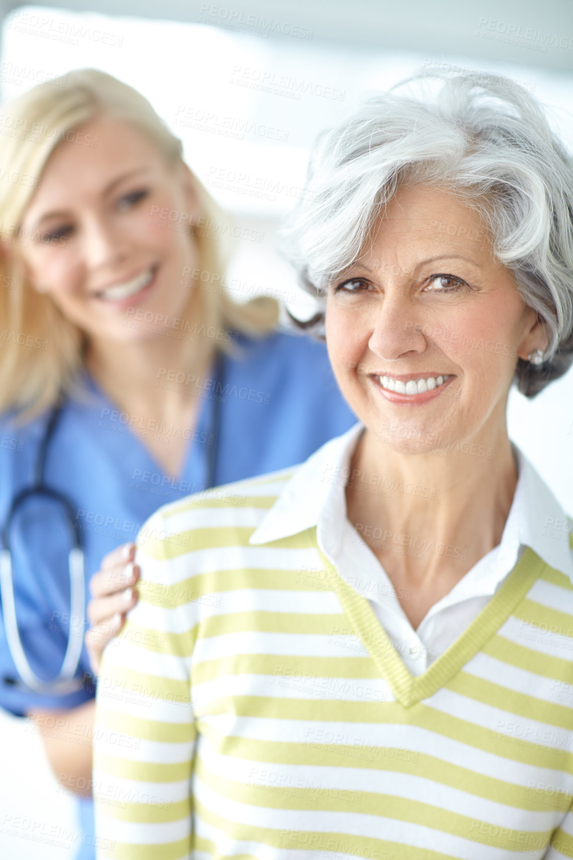 Buy stock photo Senior woman, portrait or nurse with smile for healthcare support, empathy or hope at nursing clinic. Consulting, help or friendly caregiver with patient, trust or happy person with medical service