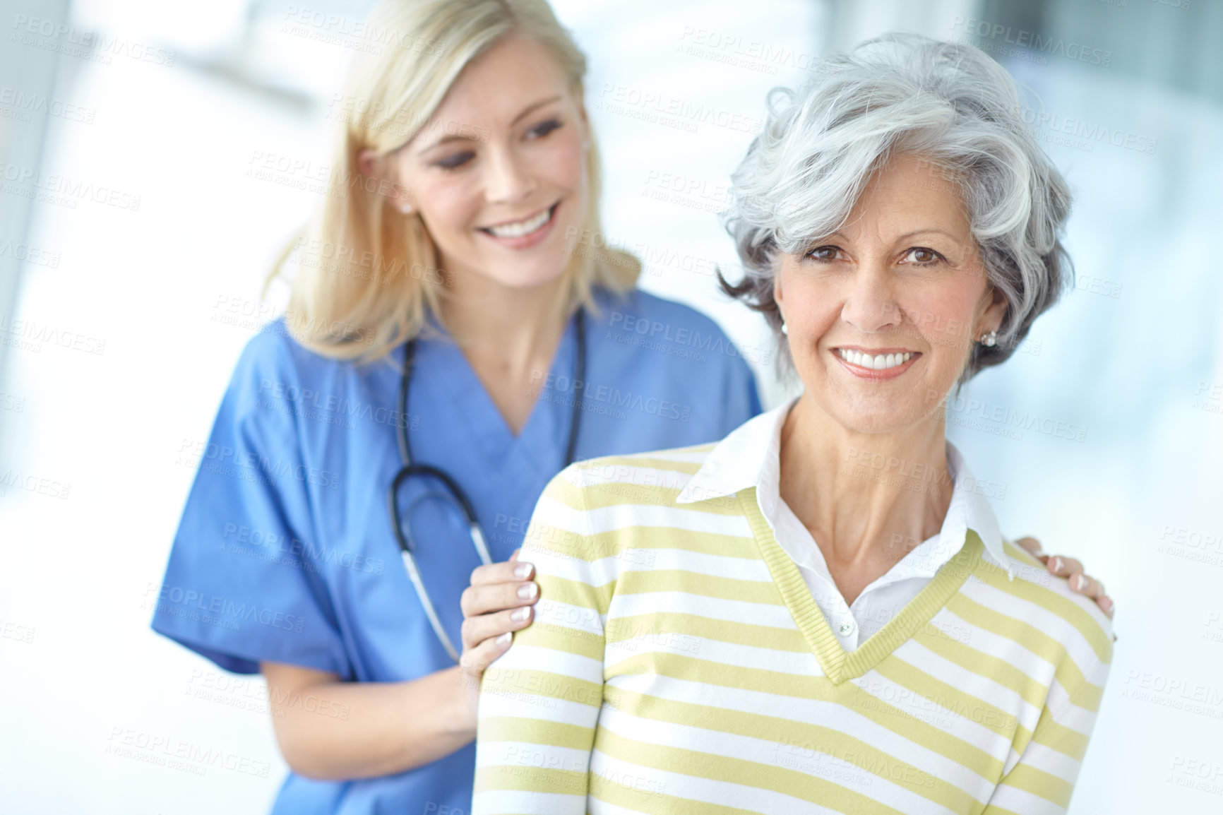 Buy stock photo Nurse, woman and mature portrait for trust, healthcare and hand on shoulder with medical worker in hospital. Appointment, checkup and caregiver for support with professional, patient and happy