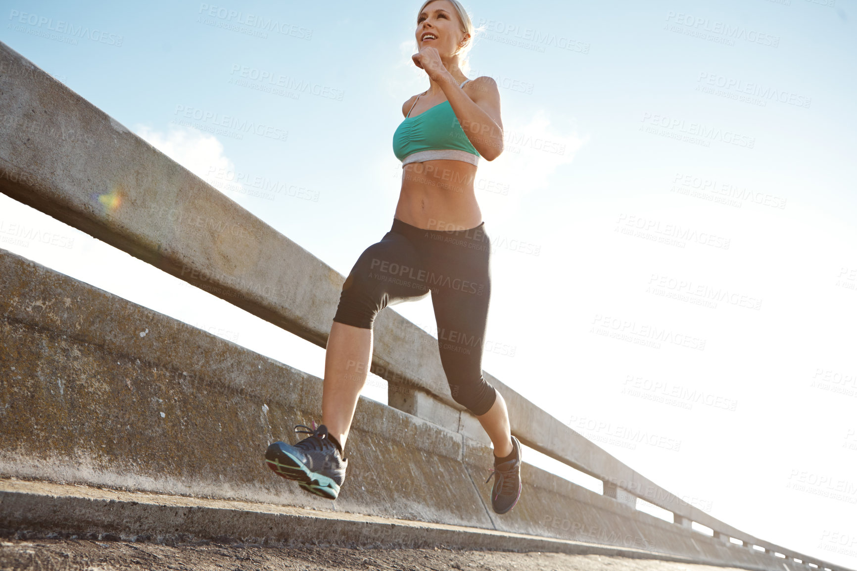 Buy stock photo Fitness, speed and woman on bridge for running with race, marathon or endurance training. Sports, health and female athlete runner with cardio workout by highway for outdoor wellness exercise.