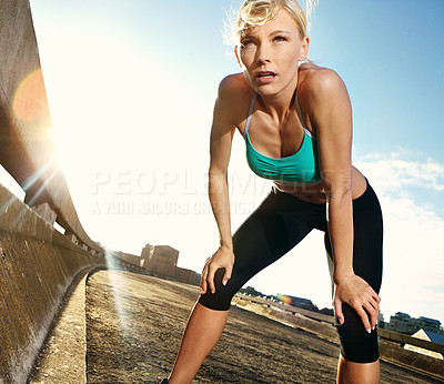 Buy stock photo City, running and woman runner with break from exercise, workout and marathon training on street. Rest, breathing and athlete with cardio, sport and fitness for race with recovery on an urban road 