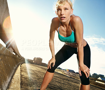 Buy stock photo City, running and tired woman runner with break from exercise, workout and marathon training on street. Rest, breathing and athlete with cardio, sport and fitness for race with recovery on road 