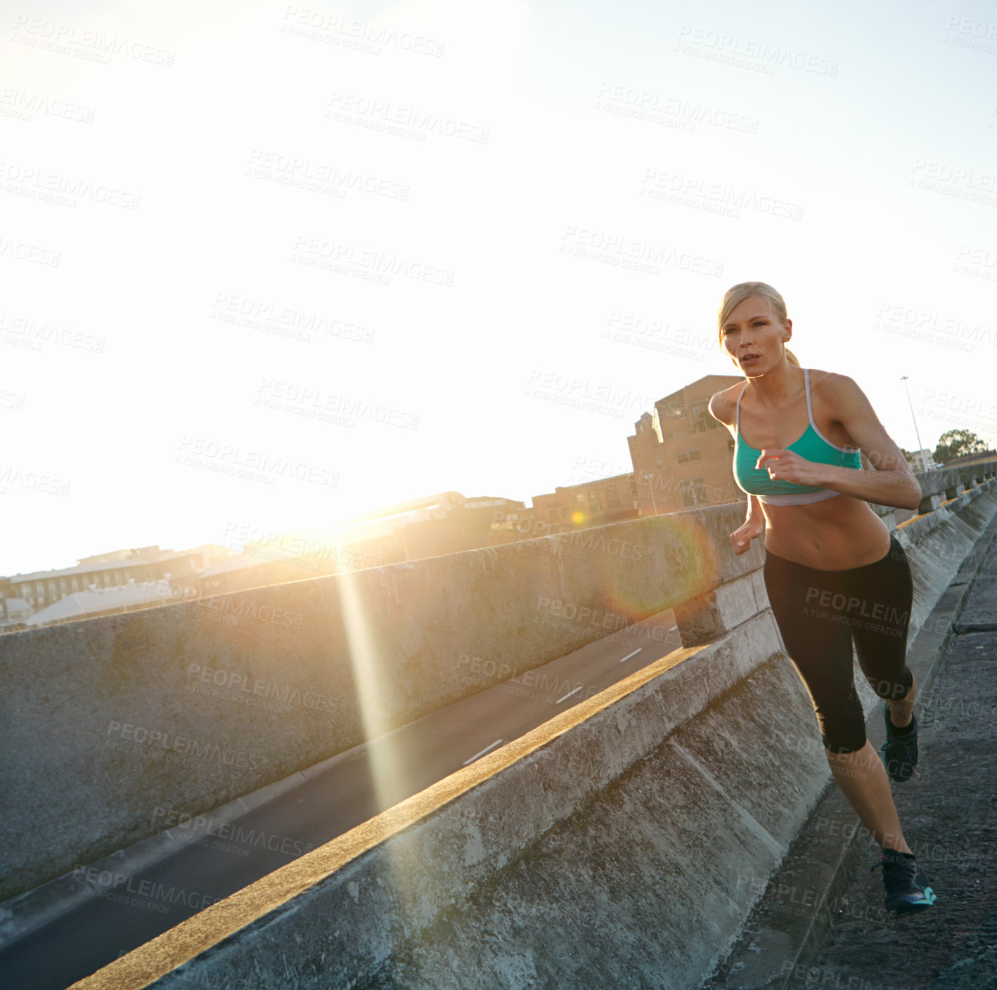 Buy stock photo Fitness, running and woman in city, sunshine and balance with journey, challenge and training. Healthy person, outdoor or runner with endurance, energy or sports with lens flare, balance or wellness