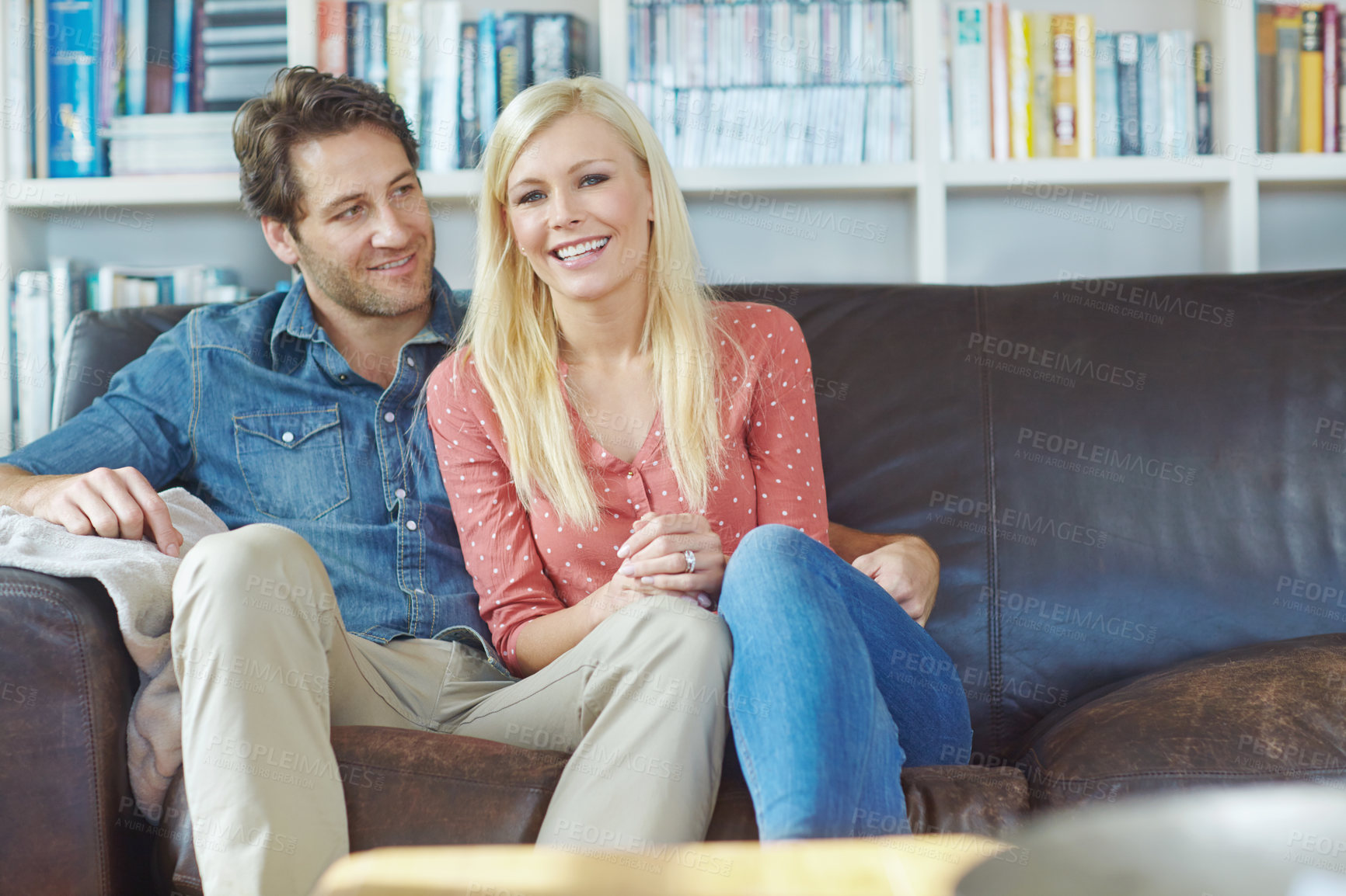 Buy stock photo Smile, hug and happy couple on couch with romance, care and bonding in home lounge. Embrace, man and woman on sofa relaxing, love and enjoying conversation, relationship and weekend in living room