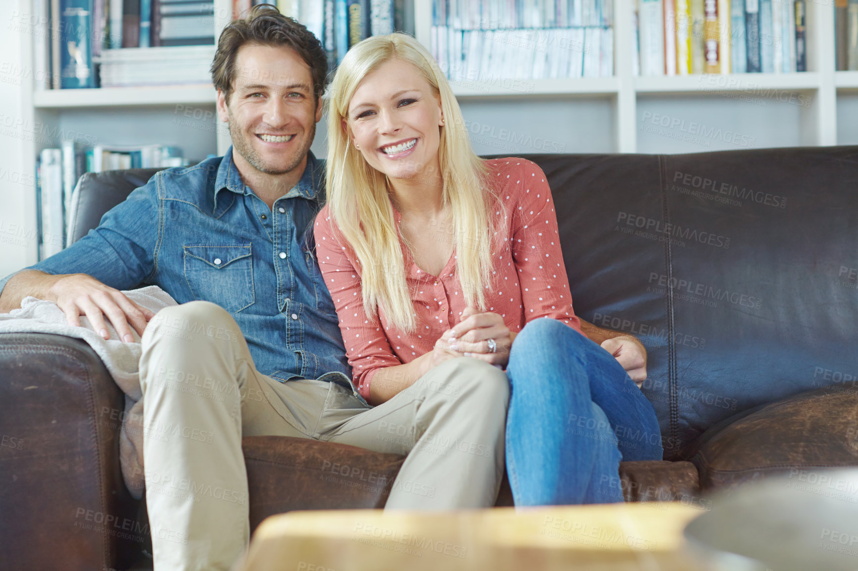 Buy stock photo Smile, portrait and happy couple on couch with romance, care and bonding in home. Embrace, man and woman on sofa relaxing, love and enjoying conversation, relationship and weekend in living room