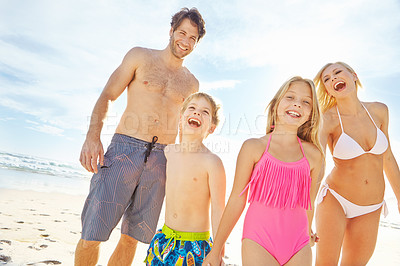 Buy stock photo Holding hands, beach and portrait of happy family on holiday outdoor for summer vacation, care or travel together. Mother, father and kids at sea for adventure, support or parents laugh with children