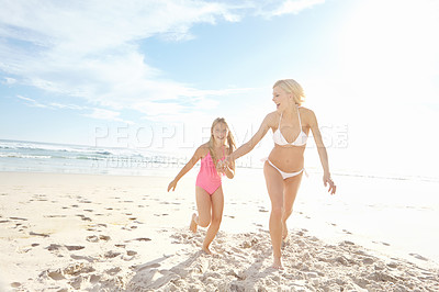 Buy stock photo Happy, woman and kid at beach with running for summer adventure, bonding and vacation in sunshine. Sea, nature and mom with girl on sand by ocean for holiday, travel and weekend trip in California